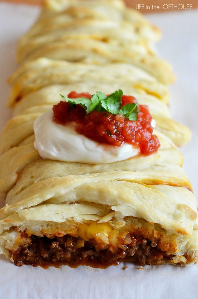 Seasoned ground beef, beans, and cheese wrapped in flaky dough. SO good!