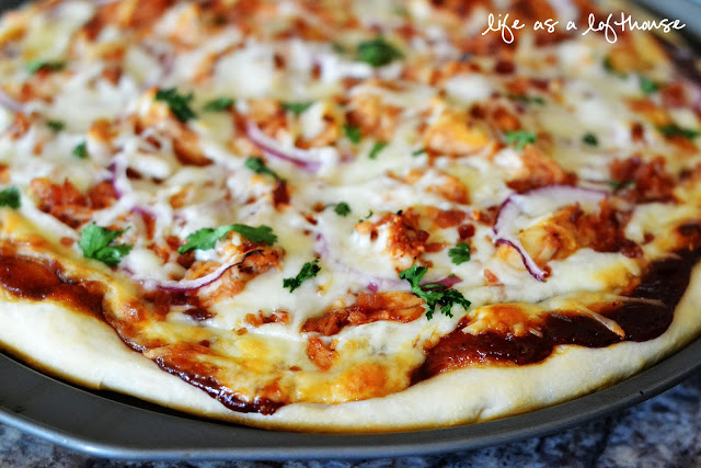 BBQ Chicken Bacon Pizza is a flavorful pizza loaded with bbq chicken, bacon, cheese, cilantro and red onion. Life-in-the-Lofthouse.com