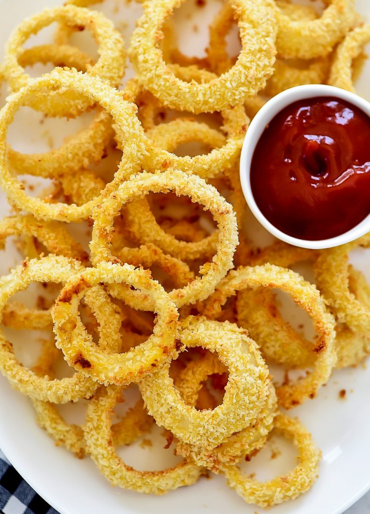 Delicious and crispy homemade Onion Rings that are baked in the oven. Life-in-the-Lofthouse