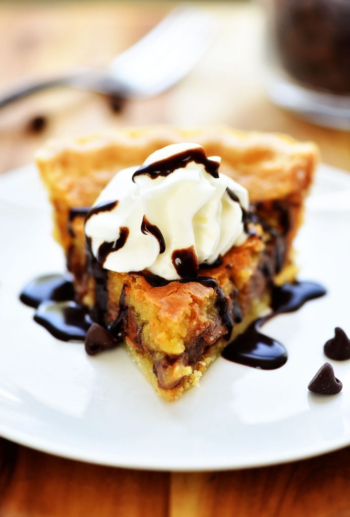 Chocolate Chip Cookie Pie is everything you love about a warm, soft chocolate chip cookie but in pie form. Life-in-the-Lofthouse.com