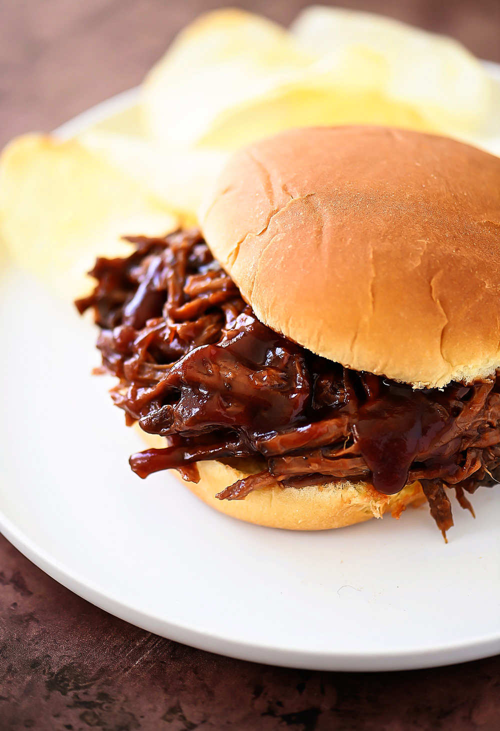 Sweet BBQ Beef sandwiches are delicious shredded beef with a sweet and savor BBQ flavor stuffed between two hamburger buns.