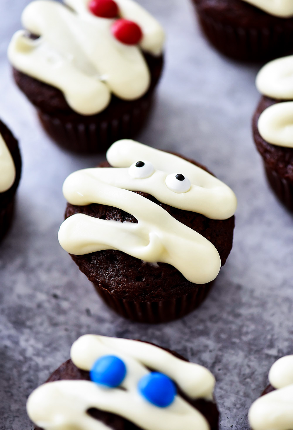 Mummy Cupcakes are delicious chocolate cupcakes decorated to look like mummies. Life-in-the-Lofthouse.com
