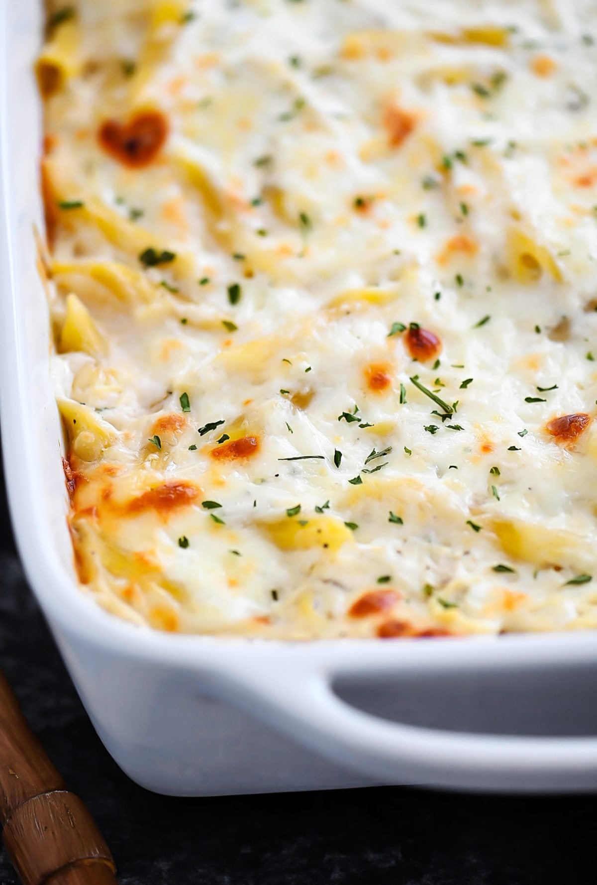 Three Cheese Chicken Alfredo Bake is cheesy, creamy heaven with Ricotta, Parmesan and Mozzarella cheese. Life-in-the-Lofthouse.com