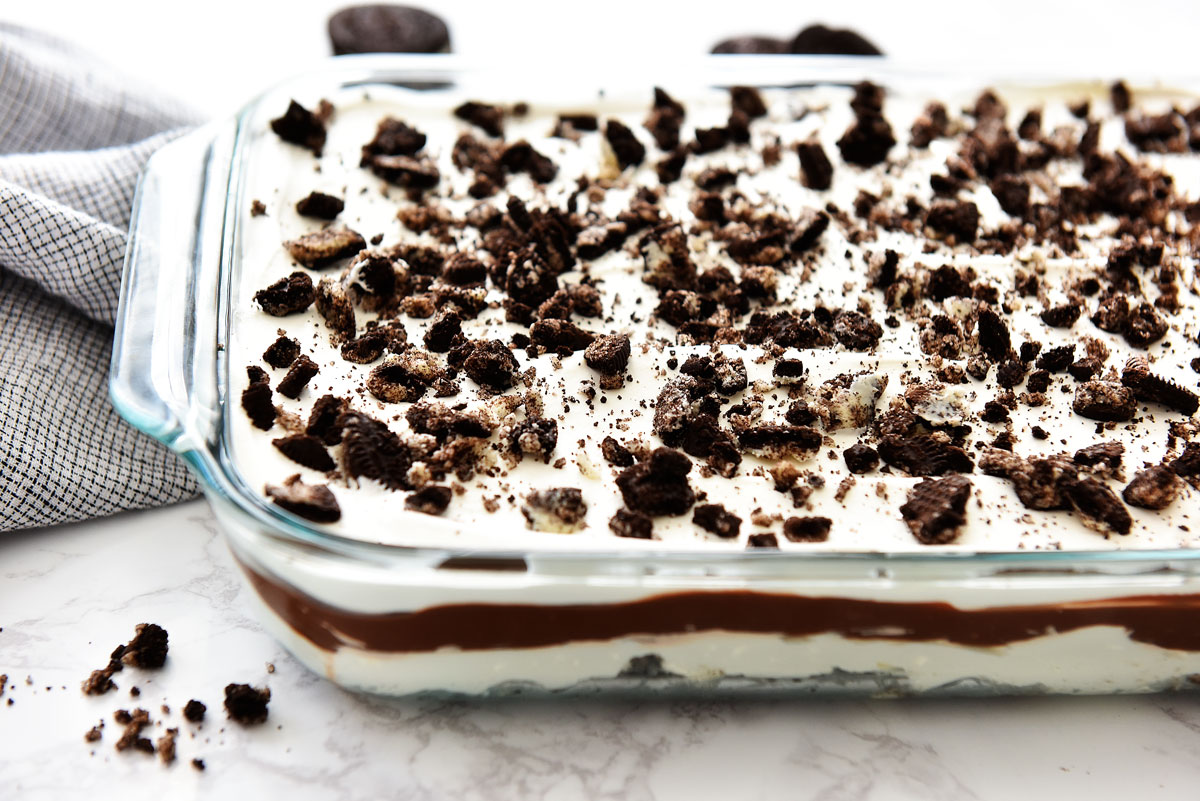 Heavenly Oreo Dessert has delicious layers of chocolate pudding, cool whip and cream cheese. Life-in-the-Lofthouse.com