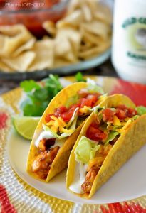 Chicken Ranch Tacos are filled with flavorful chicken, ranch dressing and all your favorite taco toppings inside crispy taco shells.