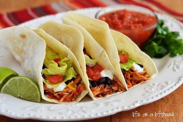 Crock Pot Chicken Tacos are so flavorful and delicious and only require 5 ingredients to make. Life-in-the-Lofthouse.com