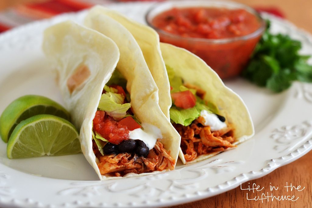 Crock Pot Chicken Tacos are so flavorful and delicious and only require 5 ingredients to make. Life-in-the-Lofthouse.com