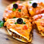 Mexican Pizza is filled with seasoned ground beef, beans, cheese and enchilada sauce stuffed between two golden flour tortillas. Life-in-the-Lofthouse.com