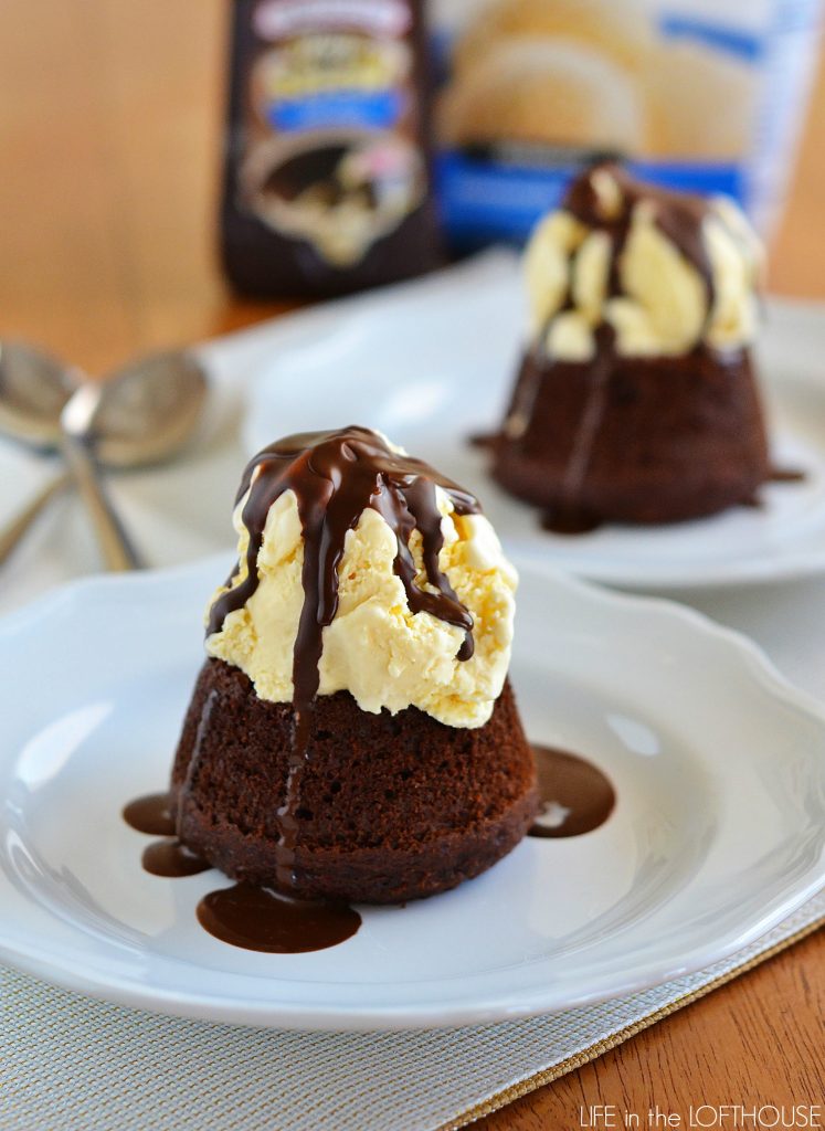 Easy Chocolate Molten Lava Cakes are mini chocolate cakes with a warm center of hot fudge, topped with a big scoop of vanilla ice cream and then drenched in chocolate magic shell. Life-in-the-Lofthouse.com