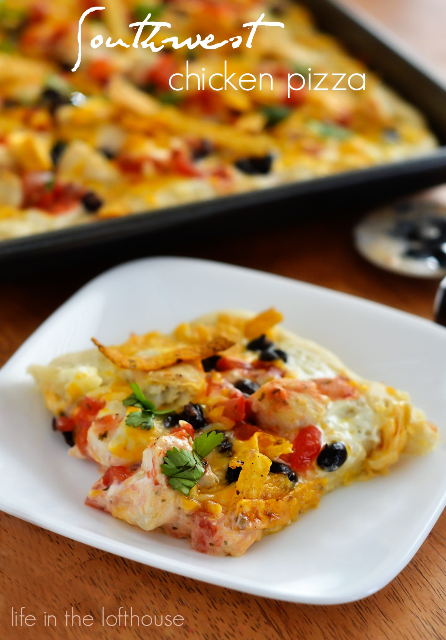 Southwest Chicken Pizza starts with ranch dressing and is topped with seasoned chicken, black beans, salsa and lots of cheese. Life-in-the-Lofthouse.com