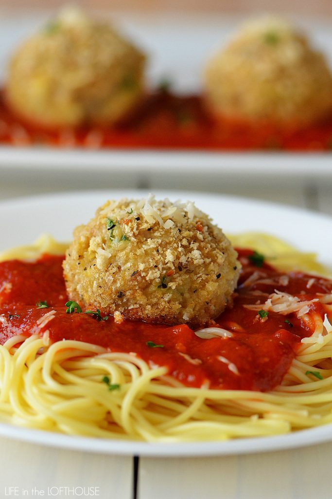 Chicken Parmesan stuffed meatballs are made of ground chicken, parmesan cheese, fresh parsley, panko bread crumbs and stuffed with mozzarella cheese. Life-in-the-Lofthouse.com