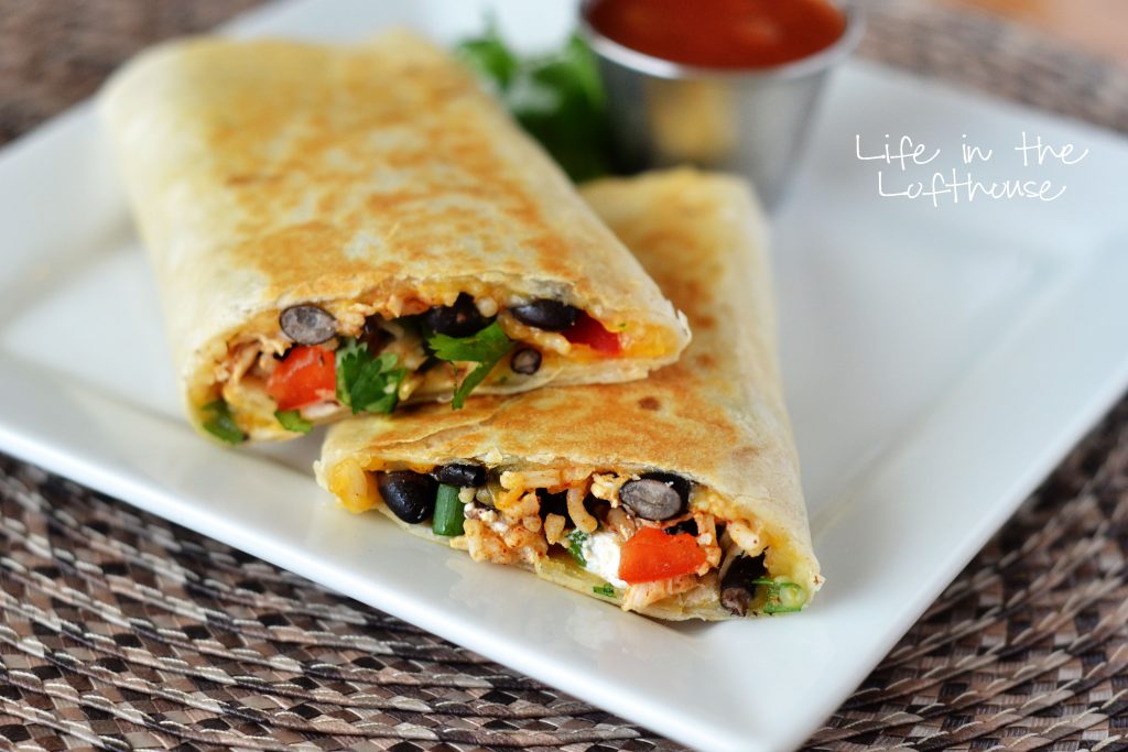 These Crispy Southwest Chicken Wraps are loaded with flavorful chicken, veggies and rice. Life-in-the-Lofthouse.com