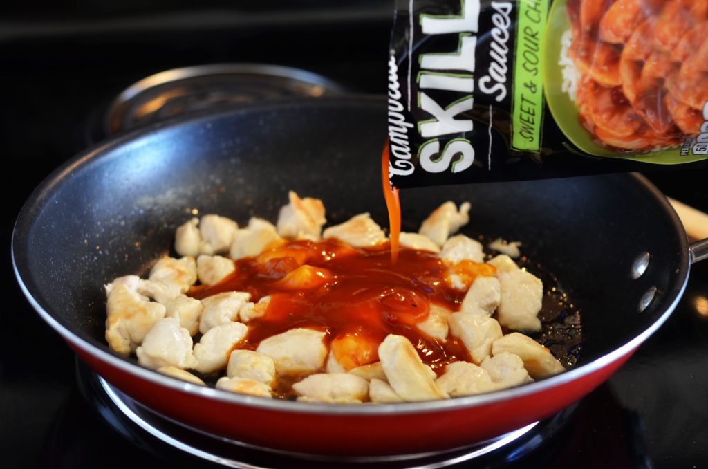 Chopped chicken breasts cooked in one skillet and covered in Campbell's sweet and sour chicken sauce. Life-in-the-Lofthouse.com