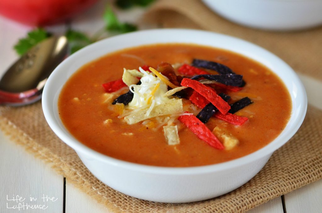 Chicken enchilada soup is a cheesy and creamy soup that tastes just like an enchilada. Life-in-the-Lofthouse.com