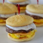 Crescent buns, sausage patties, cheese and creamy gravy make up these little breakfast sliders. Life-in-the-Lofthouse.com