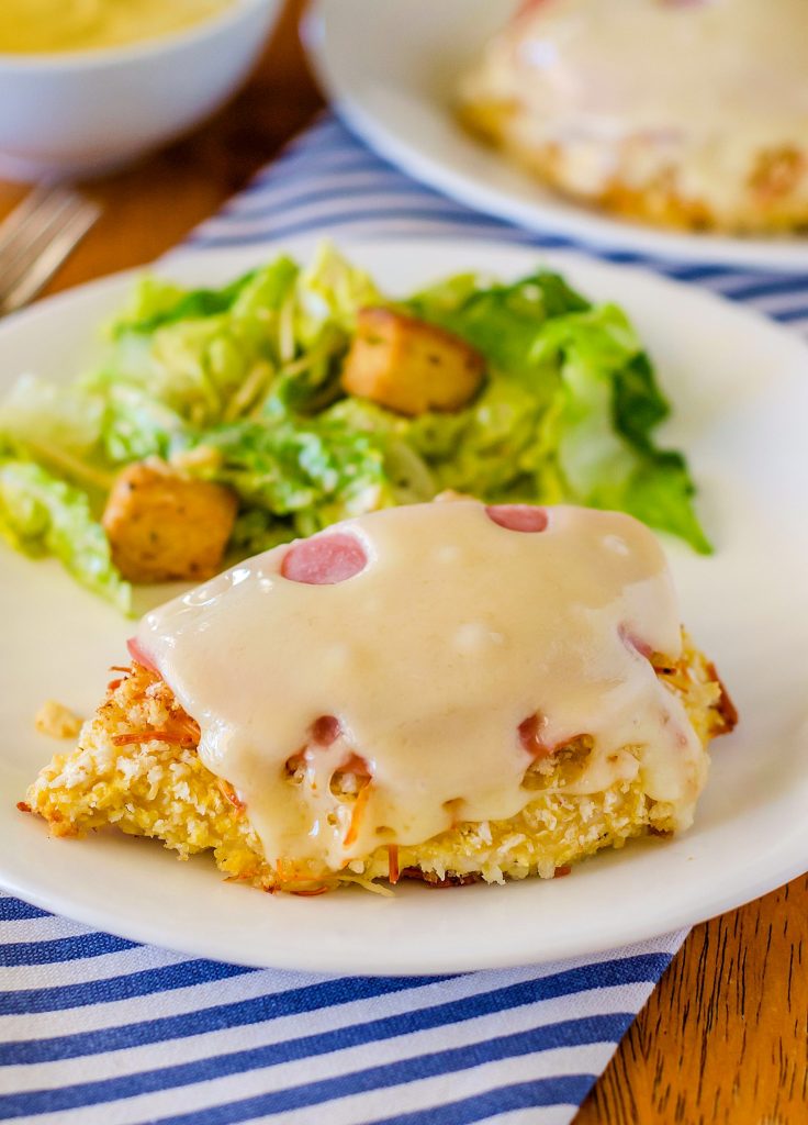 Malibu chicken is crispy baked chicken with layers of ham and Swiss cheese. Life-in-the-Lofthouse.com