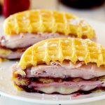 Monte Cristo Waffle Sandwiches have layers of ham, turkey, cheese and raspberry jam placed between two golden waffles. Life-in-the-Lofthouse.com