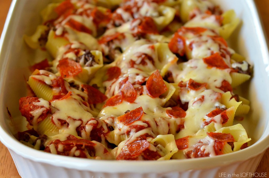 Pizza Stuffed Shells have all the components of a pizza stuffed into pasta shells. Life-in-the-Lofthouse.com
