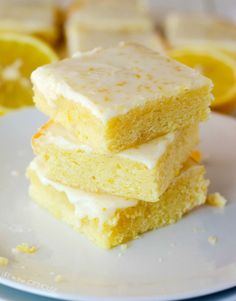 Soft and moist lemon brownies with a sweet lemon glaze. Life-in-the-Lofthouse.com