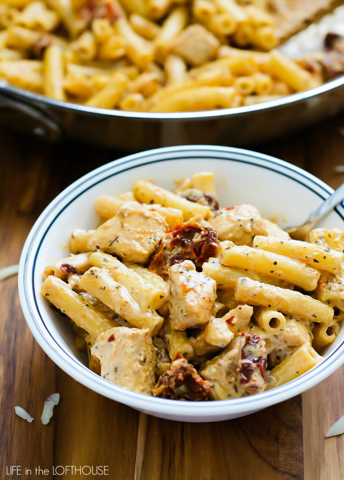 Chicken Mozzarella pasta with sun-dried tomatoes is a delicious pasta salad full of Italian flavor. Life-in-the-Lofthouse.com