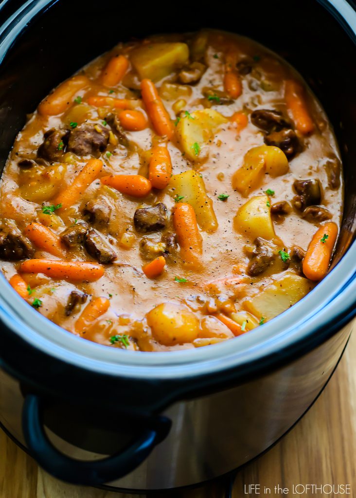 Slow Cooker Beef Stew is hearty pieces of beef and vegetables slow cooked in gravy. Life-in-the-Lofthouse.com