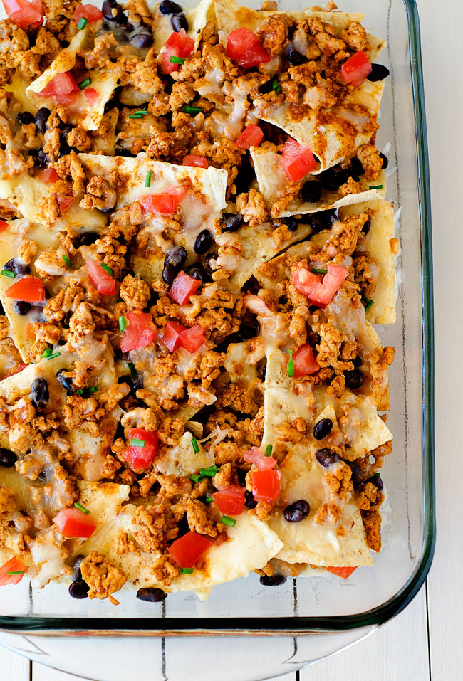Nachos topped with taco-flavored chicken, black beans and lots of gooey cheese. Life-in-the-Lofthouse.com
