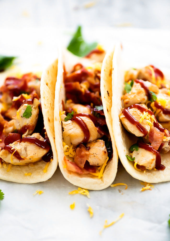 BBQ Chicken Bacon Tacos are filled with grilled chicken, bacon, cheese and barbecue sauce all inside a flour tortilla. Life-in-the-Lofthouse.com