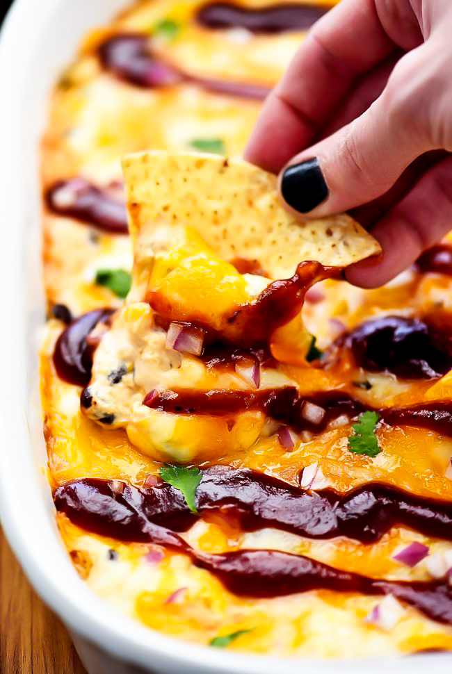 A delicious dip filled with chopped chicken, BBQ sauce, cream cheese, beans and corn. Life-in-the-Lofthouse.com