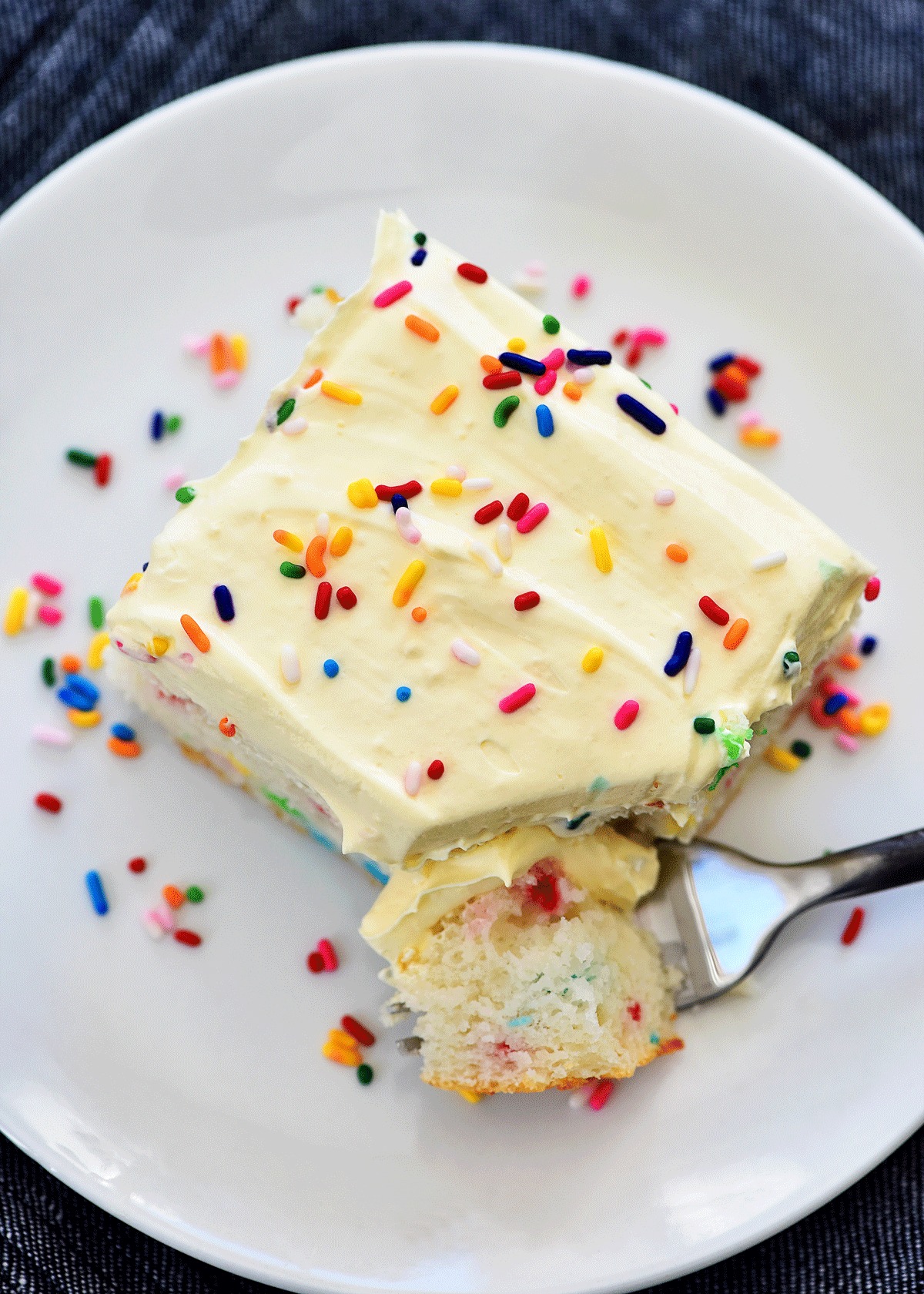 Skinny Funfetti Cake is a light, moist cake filled with sprinkles and lighter ingrediants. Life-in-the-Lofthouse.com