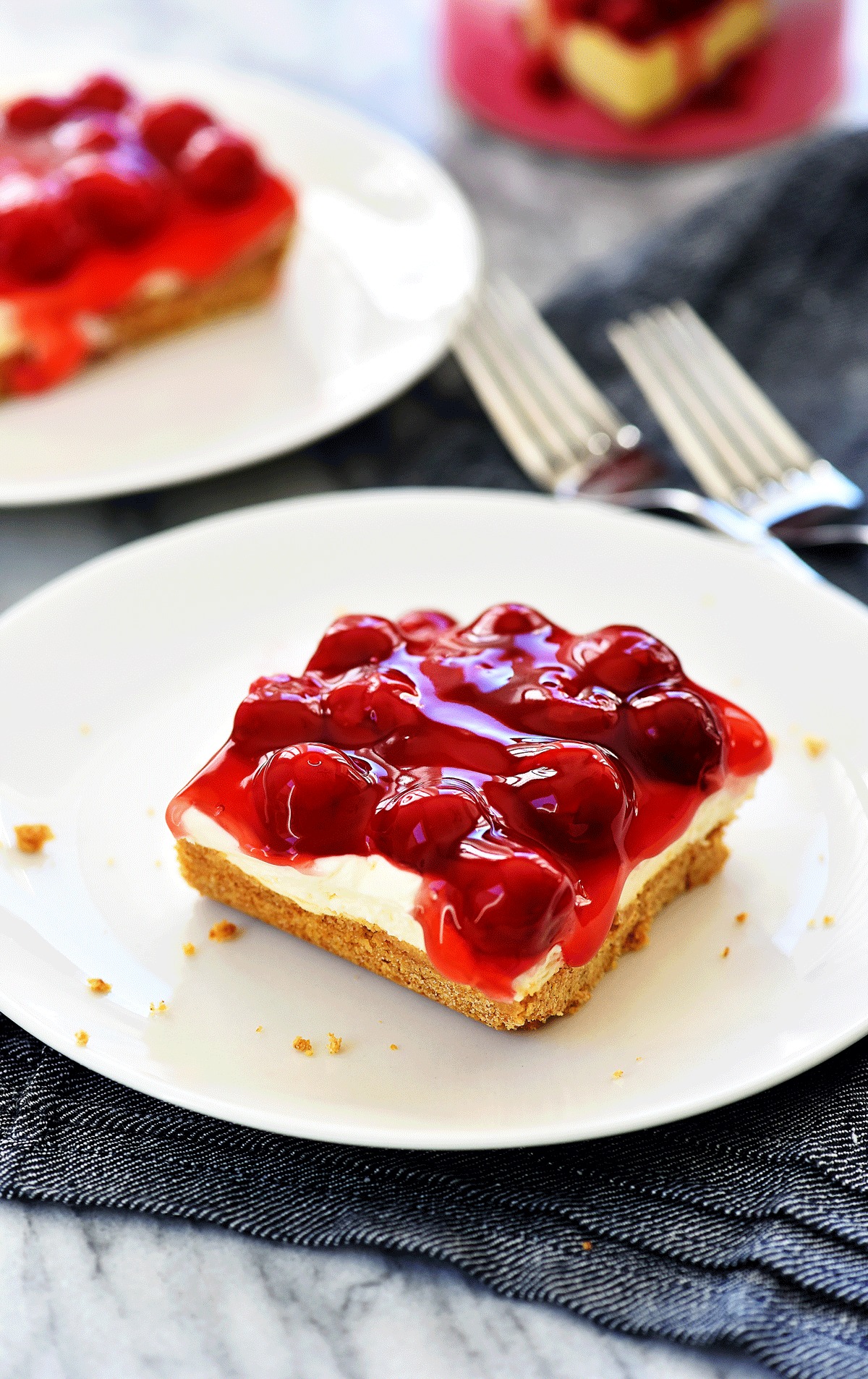 Cherry Delight is an easy dessert recipe with a graham cracker crust, a cheesecake center, and topped off with cherry pie filling. Life-in-the-Lofthouse.com