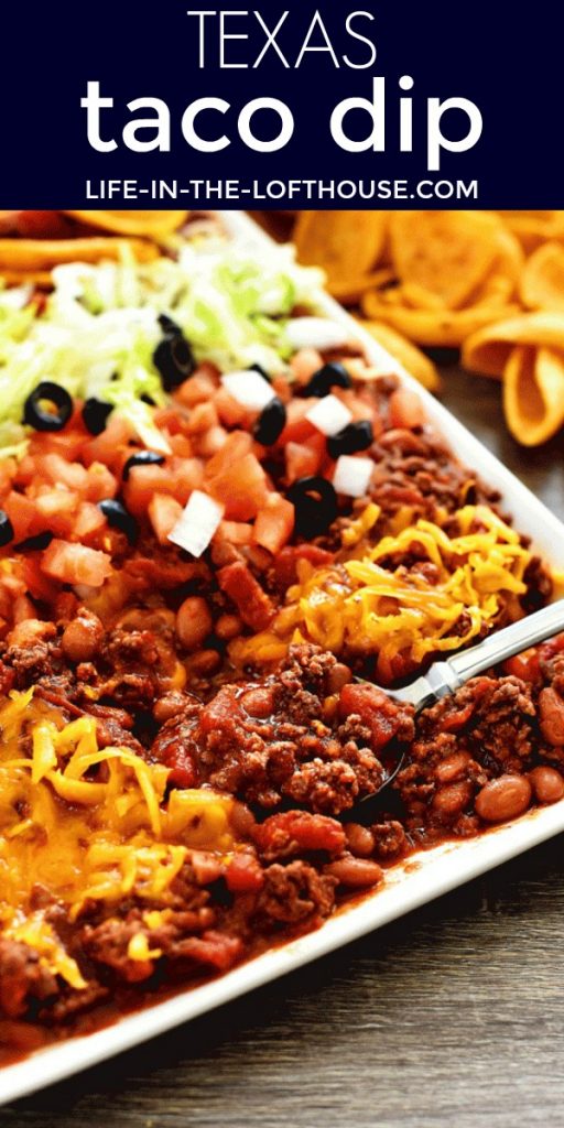 Texas Taco Dip is filled with beans, beef chili and loads of cheese. Life-in-the-Lofthouse.com