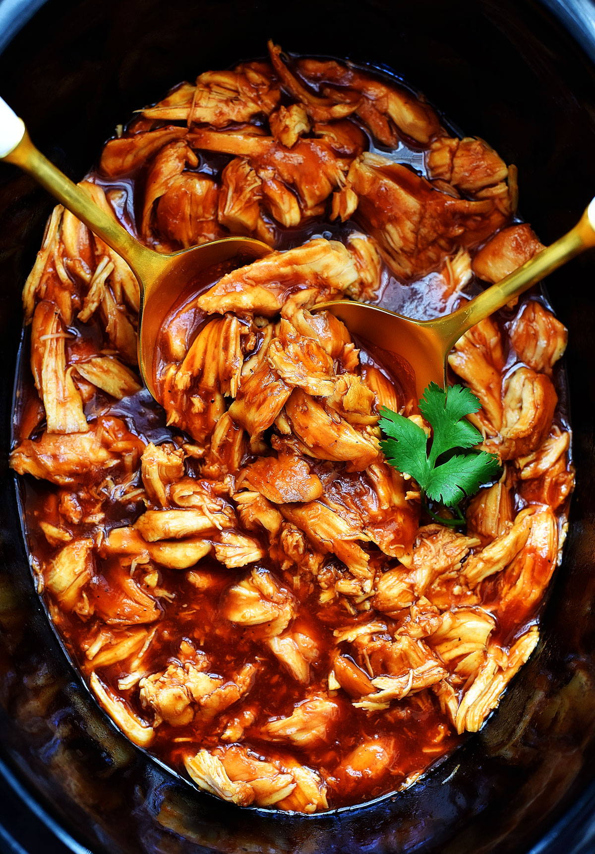 Slow Cooker BBQ Chicken is tender, zesty and flavor-packed barbecue chicken that is slow cooked in a crock pot. Life-in-the-Lofthouse.com