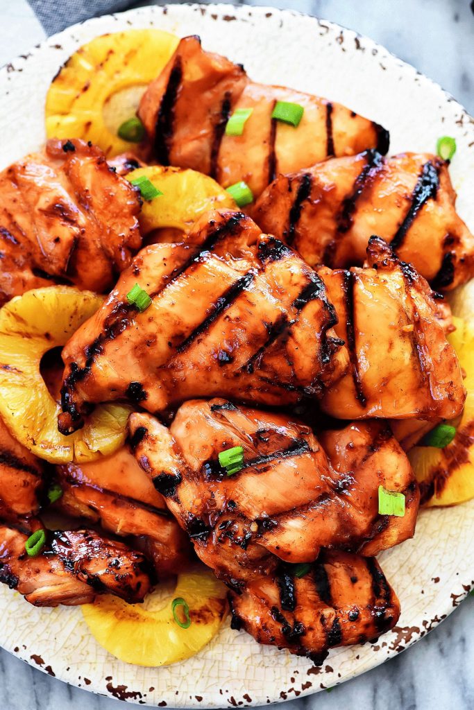 Grilled Huli Huli Chicken is delicious grilled chicken bursting with pineapple and Hawaiian flavor. Life-in-the-Lofthouse.com