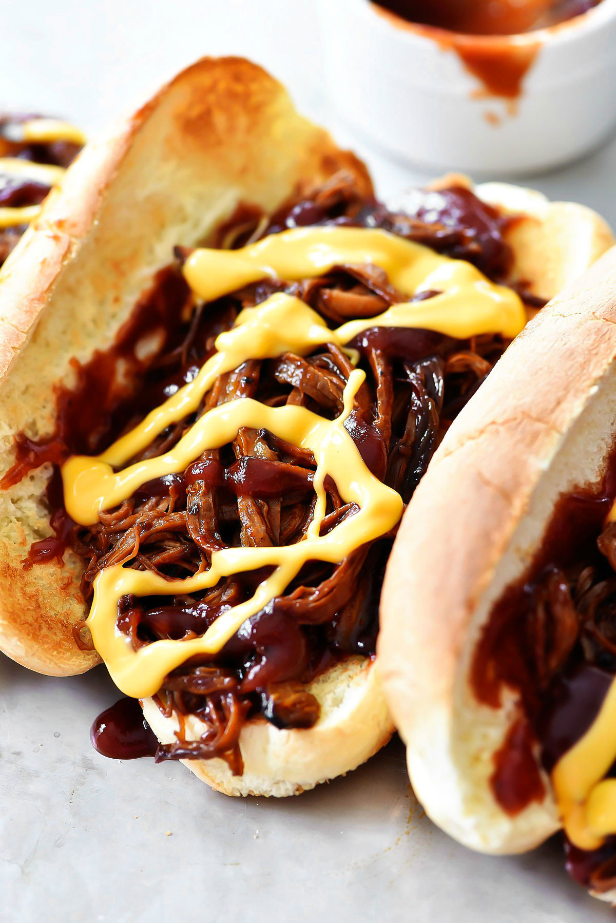 BBQ beef brisket sandwiches hang soft BBQ Brisket loaded in a hoagie bun with drizzles of cheddar cheese. Life-in-the-Lofthouse.com  BBQ Pork Brisket Sandwiches BBQ Beef Brisket Sandwiches30