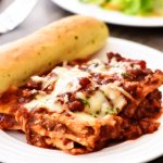 This Cream Cheese Lasagna is made with an easy homemade tomato sauce and loaded with cheese. Life-in-the-Lofthouse.com