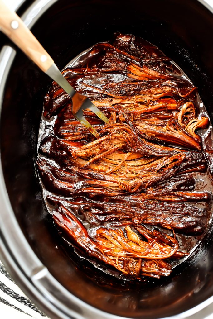 Slow Cooker BBQ Beef Brisket is tender and flavorful beef that slow cooks all day. Life-in-the-Lofthouse.com