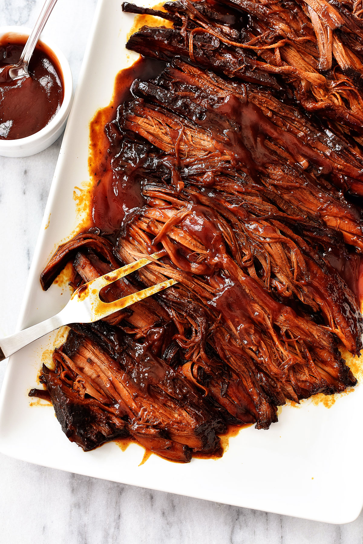 Slow Cooker BBQ Beef Brisket is tender and flavorful beef that slow cooks all day. Life-in-the-Lofthouse.com