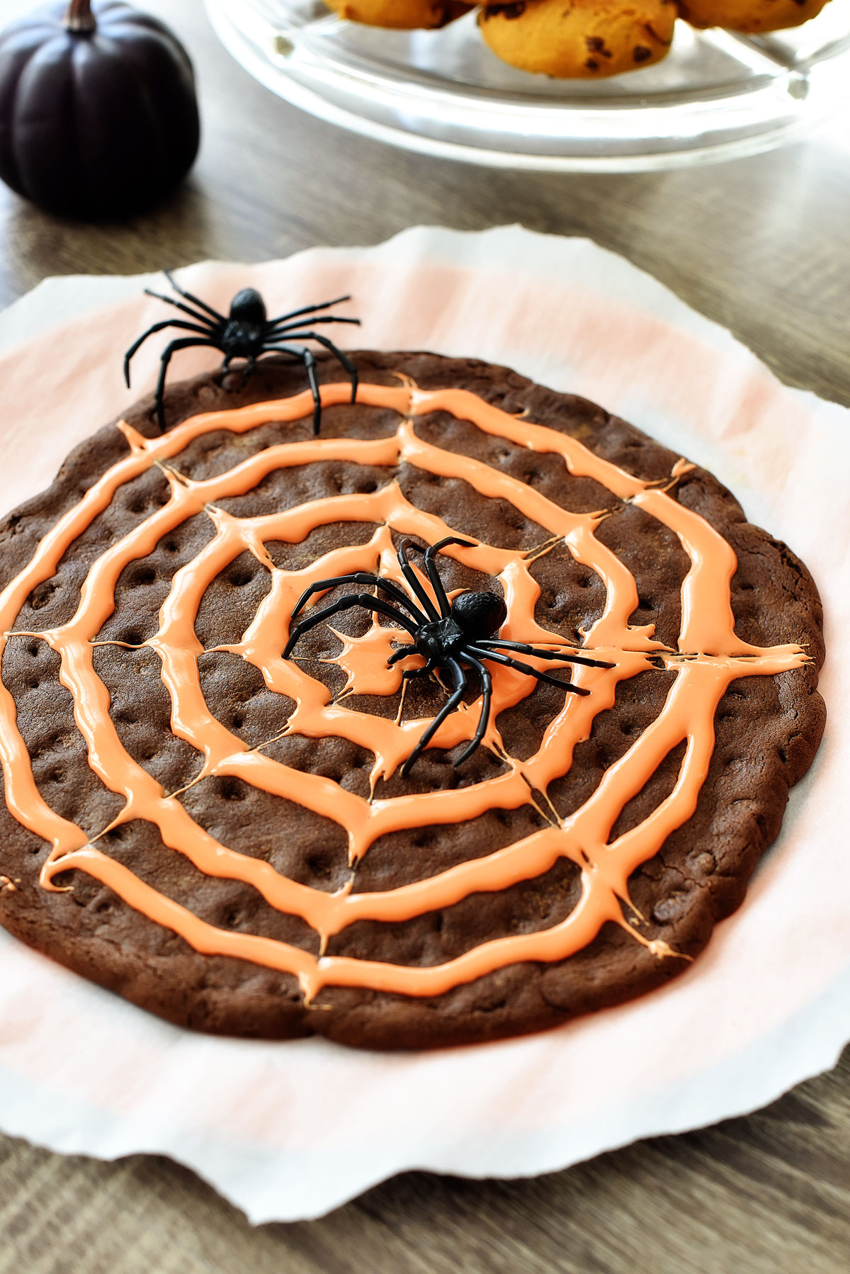 Spider web cookie is a delicious chocolate cookie with creamy vanilla frosting in a web pattern. Life-in-the-Lofthouse.com