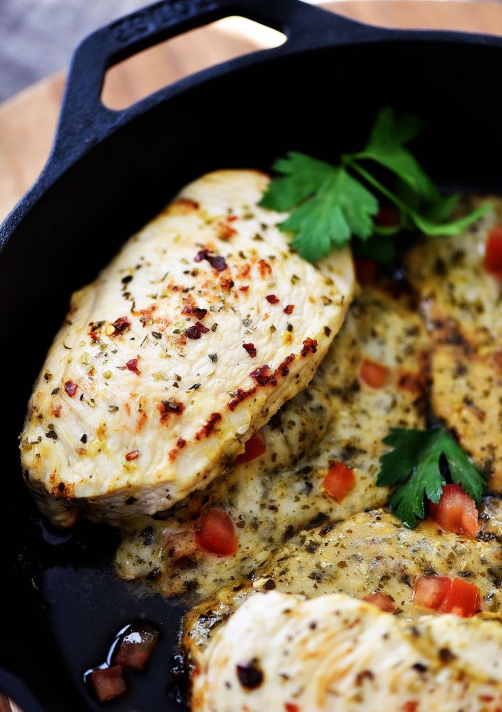 Italian stuffed chicken is chicken covered in Italian dressing and seasonings, then stuffed with Mozzarella cheese and basil pesto. Life-in-the-Lofthouse.com