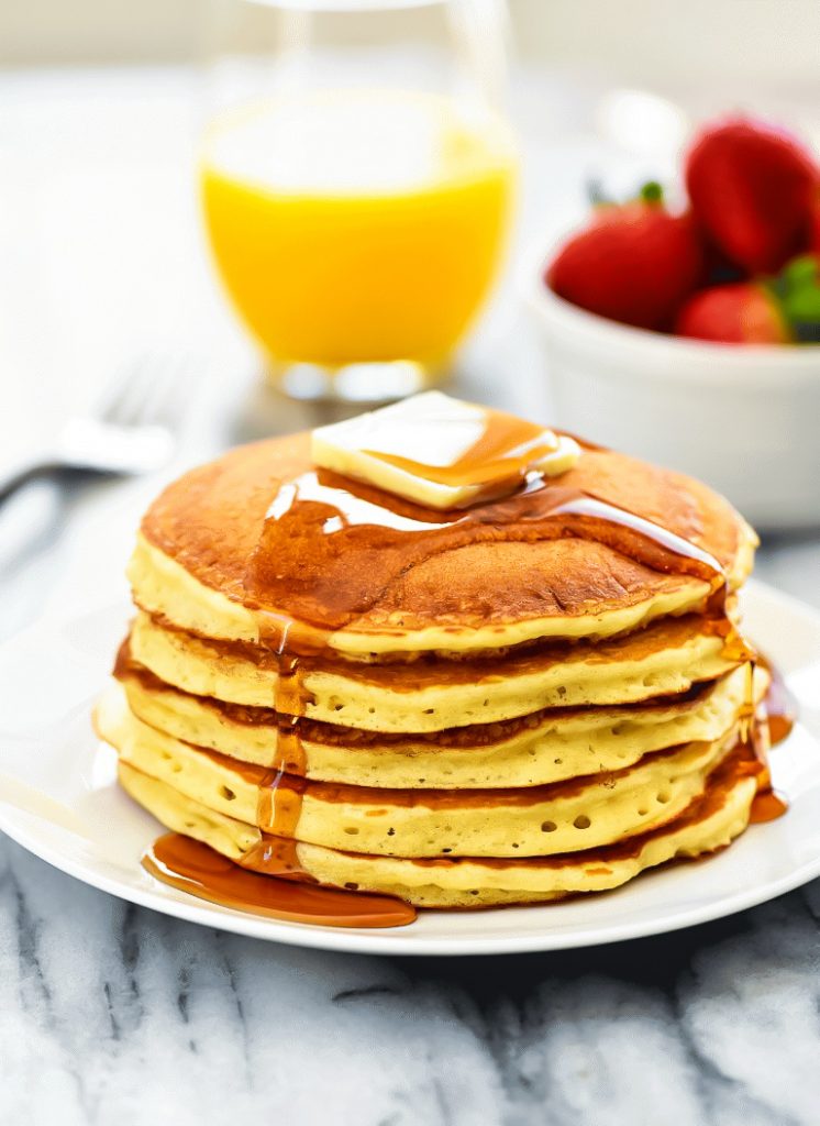 These copycat IHOP Pancakes are golden and fluffy pancakes that taste just like the ones from the popular restaurant chain. Life-in-the_Lofthouse.com