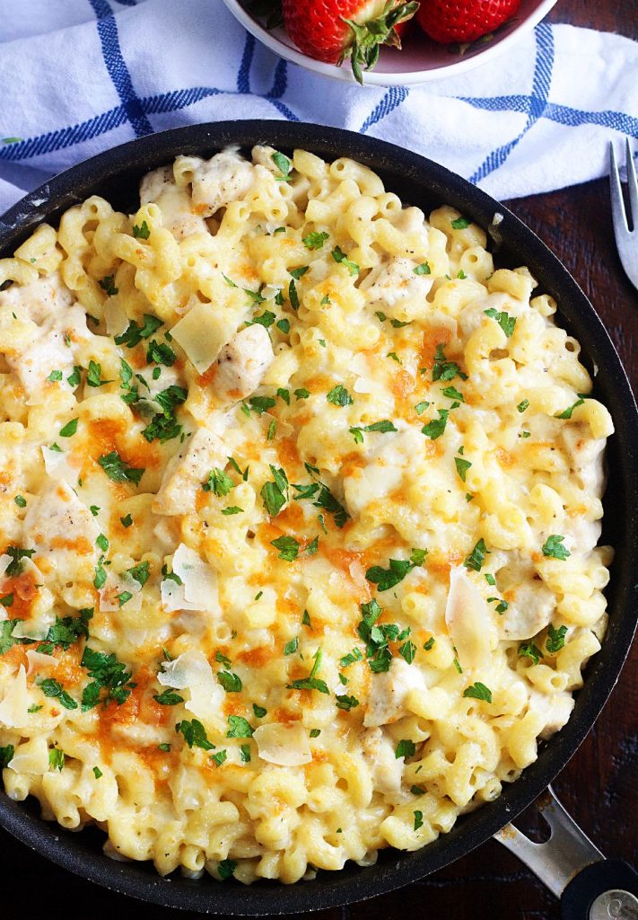 Chicken Alfredo pasta bake is a creamy and cheesy pasta dinner all made in one skillet. Life-in-the-Lofthouse.com