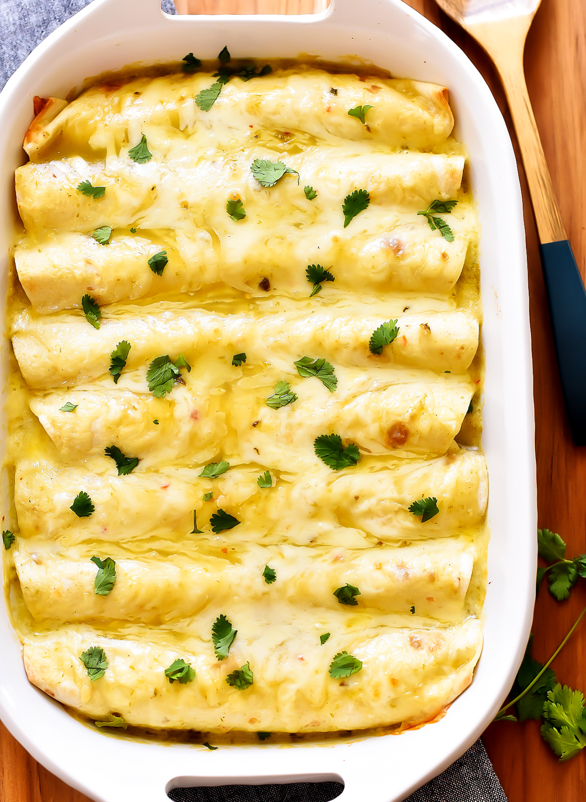 Chicken enchiladas with green chiles and pepper jack cheese.