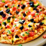 Chicken Taco Pizza is loaded with seasoned chicken, refried beans and cheese. Life-in-the-Lofthouse.com