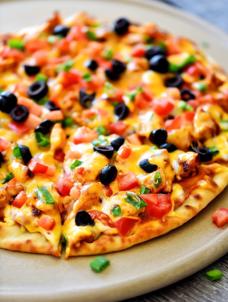 Chicken Taco Pizza is loaded with seasoned chicken, refried beans and cheese. Life-in-the-Lofthouse.com