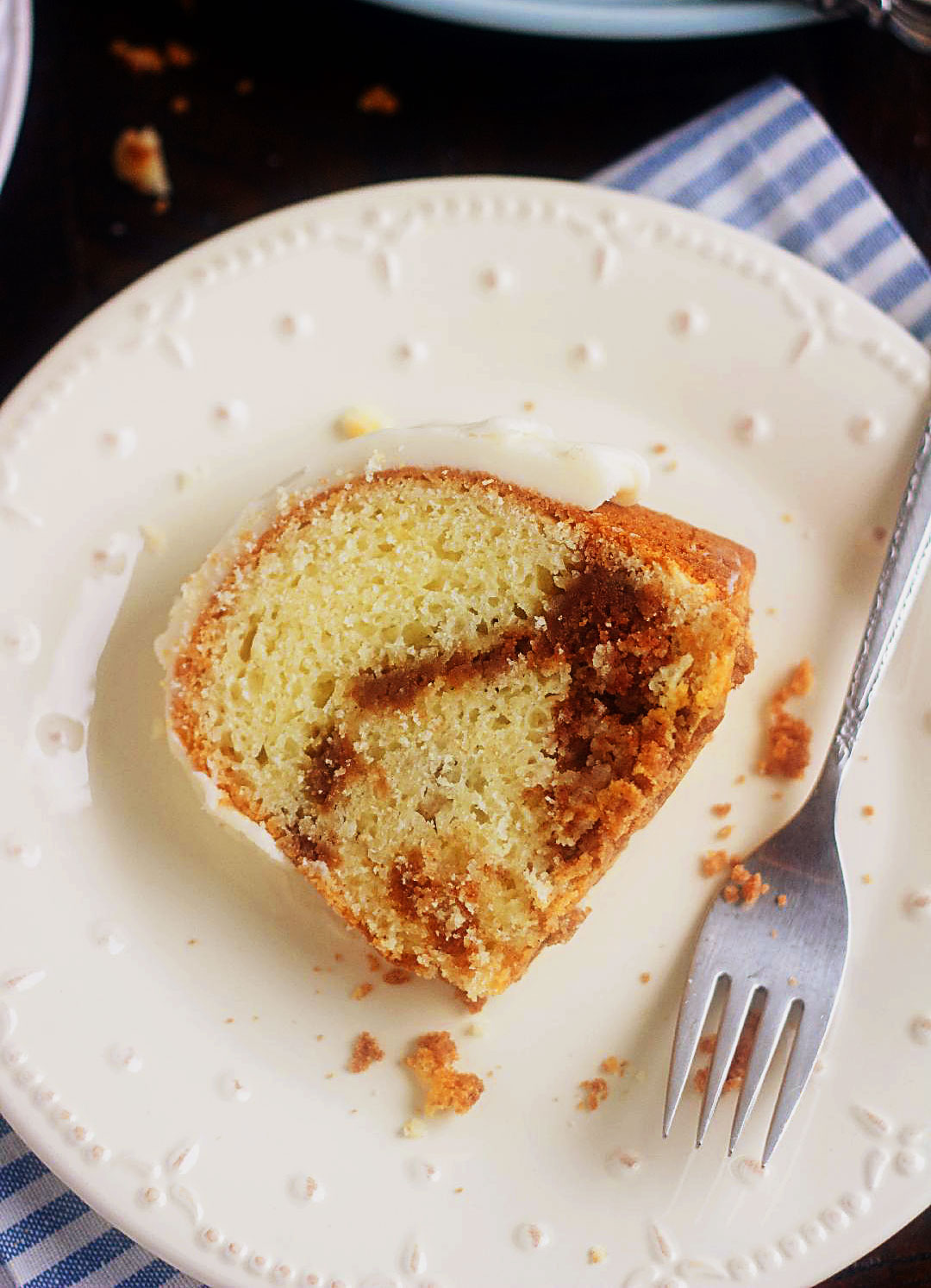 Sour Cream Coffee Cake with Browned Butter Glaze is a delicious cake with cinnamon streusel swirled throughout that is topped with a browned butter glaze. Life-in-the-Lofthouse.com