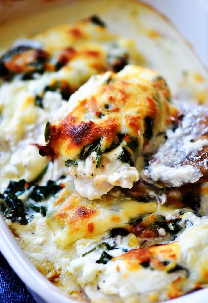 Cheesy Chicken Spinach Bake is loaded with a creamy cheese mixture, sautéed spinach and chicken breasts. Life-in-the-Lofthouse.com