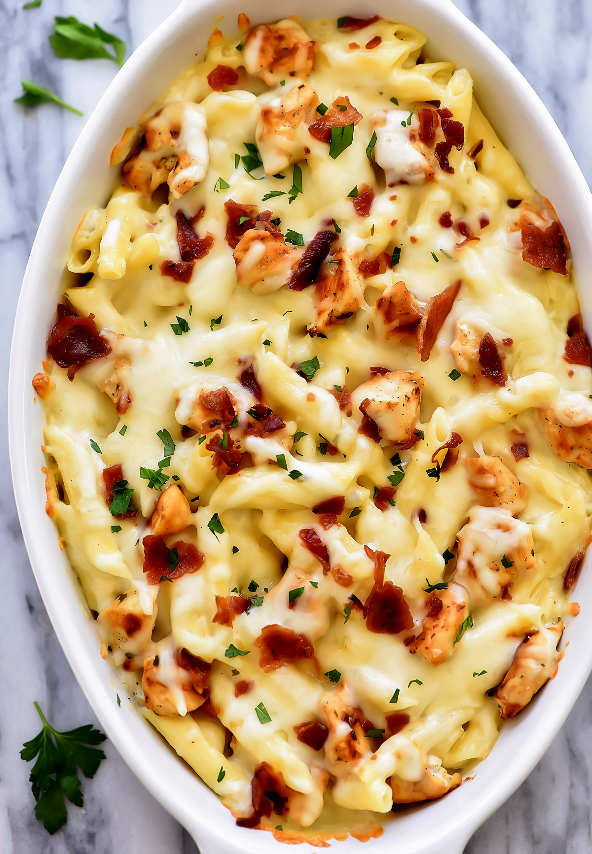 Chicken Ranch Pasta Bake has chicken, bacon and mozzarella cheese and is full of creamy ranch flavor. Life-in-the-Lofthouse.com
