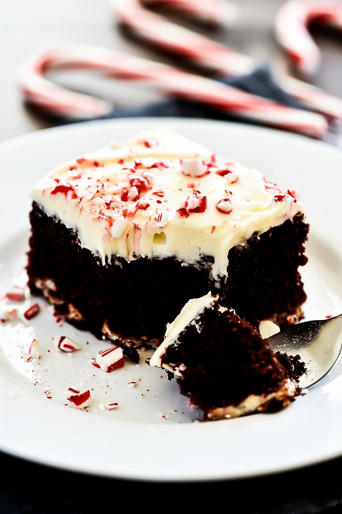 Swirls of cheesecake run through this chocolate cake with cream cheese frosting and crushed candy canes. Life-in-the-Lofthouse.com