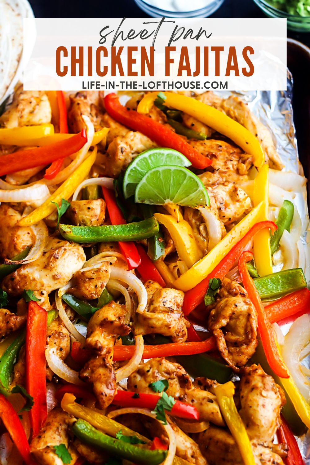 Sheet Pan Chicken Fajitas are pieces of chicken, peppers and onions full of southwest flavor. Life-in-the-Lofthouse.com
