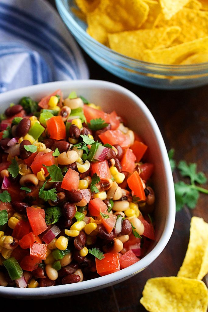 Texas Caviar is loaded with beans and diced fresh veggies tossed in a homemade vinaigrette. Life-in-the-Lofthouse.com